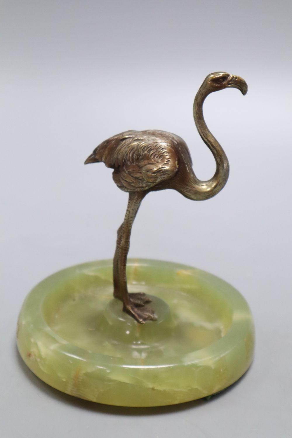 A 1920s bronze flamingo, on onyx base, height 15cm